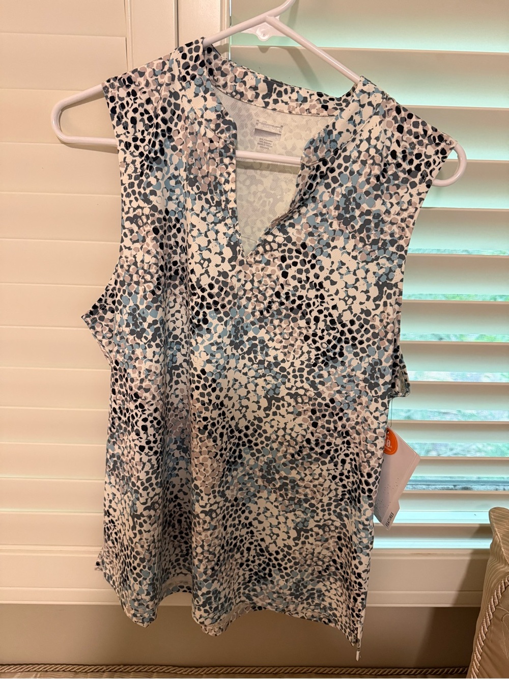 Hind Short-Sleeve V-Neck Printed Top in White, Black & Light Blue and beige.